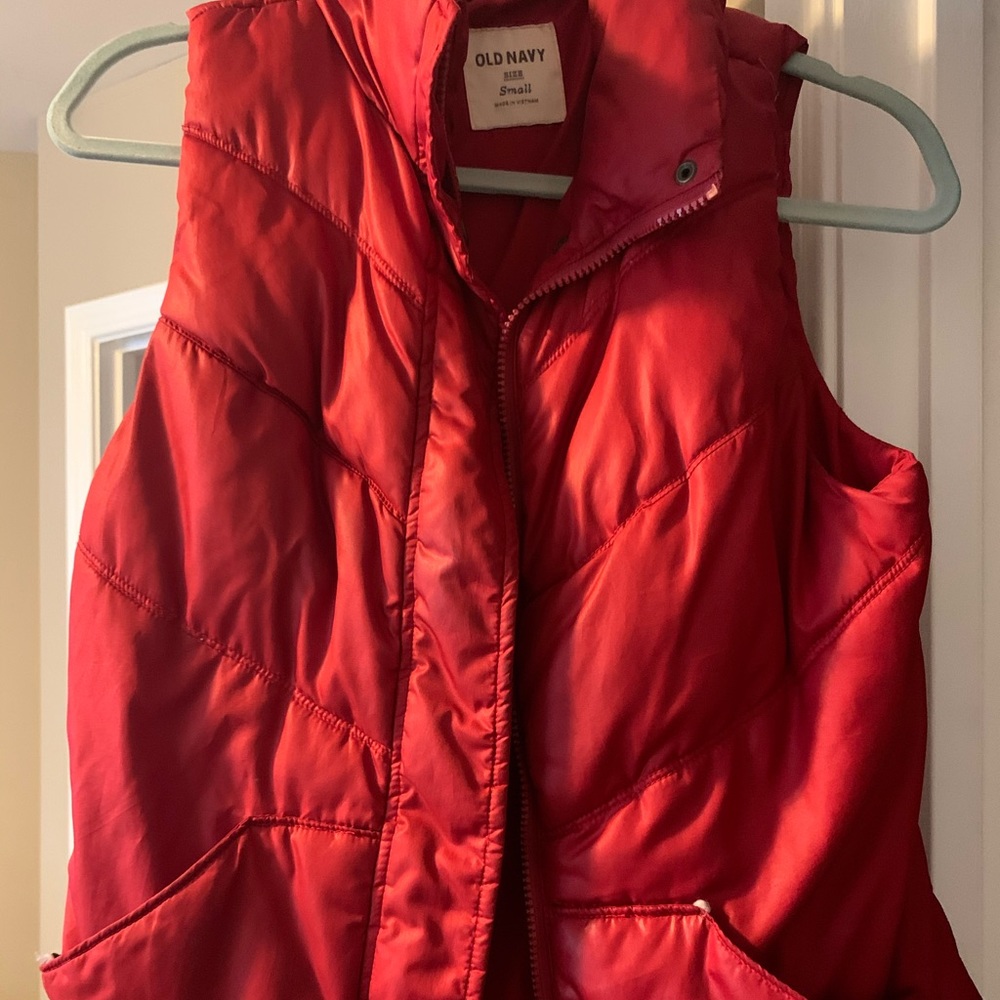 Old navy puffy vest. Small rip.
